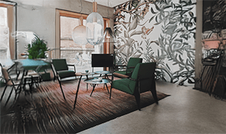 Stylish living space featuring green armchairs, a modern glass table, and a nature-themed mural. Ideal for interior design inspiration.